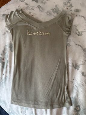 bebe Sage V-Neck Short Sleeve Top with Rhinestone Logo
